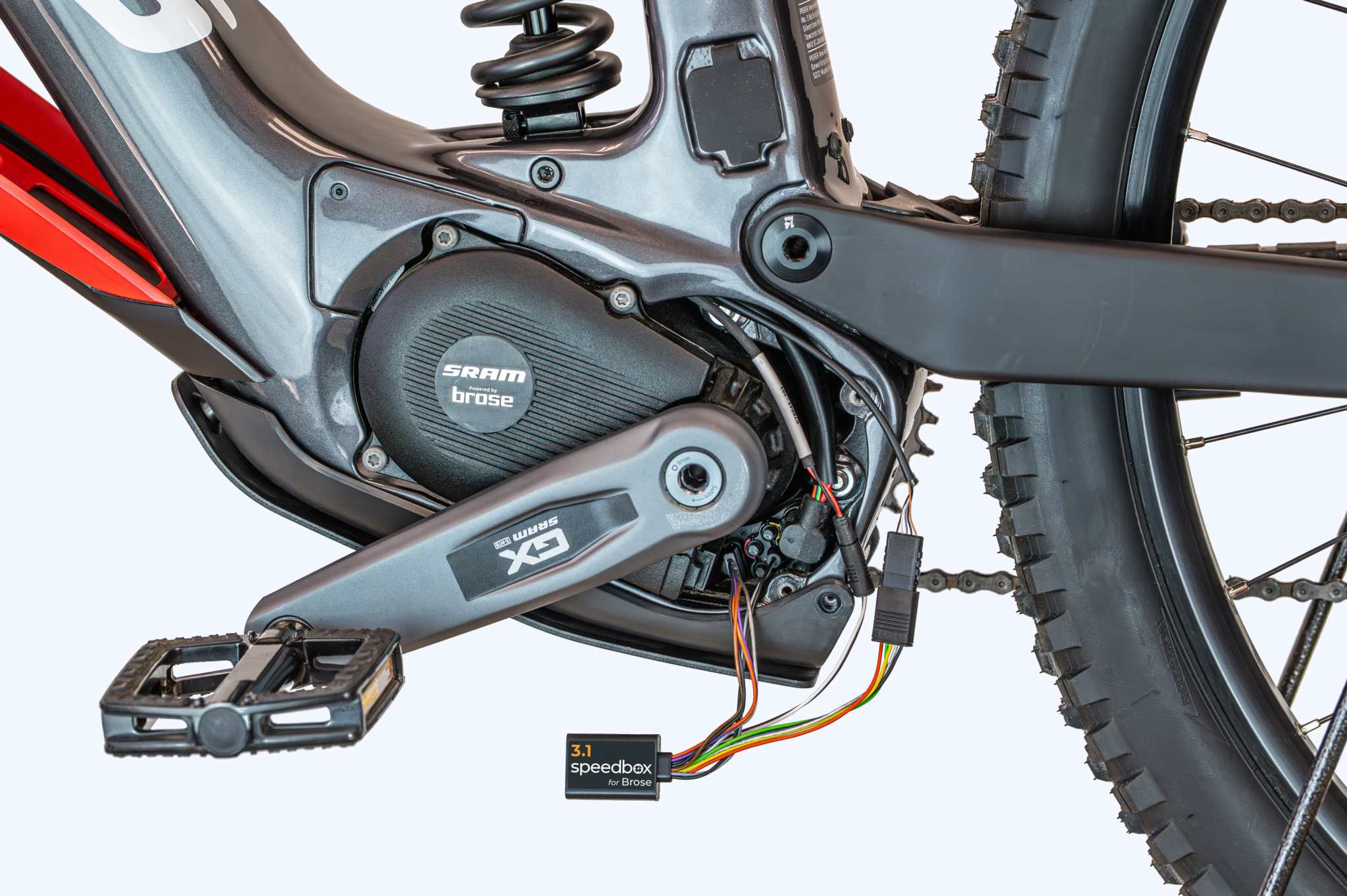 SpeedBox 3.1 module installed on Specialized Brose e-bike motor for removing speed limit and enhancing performance