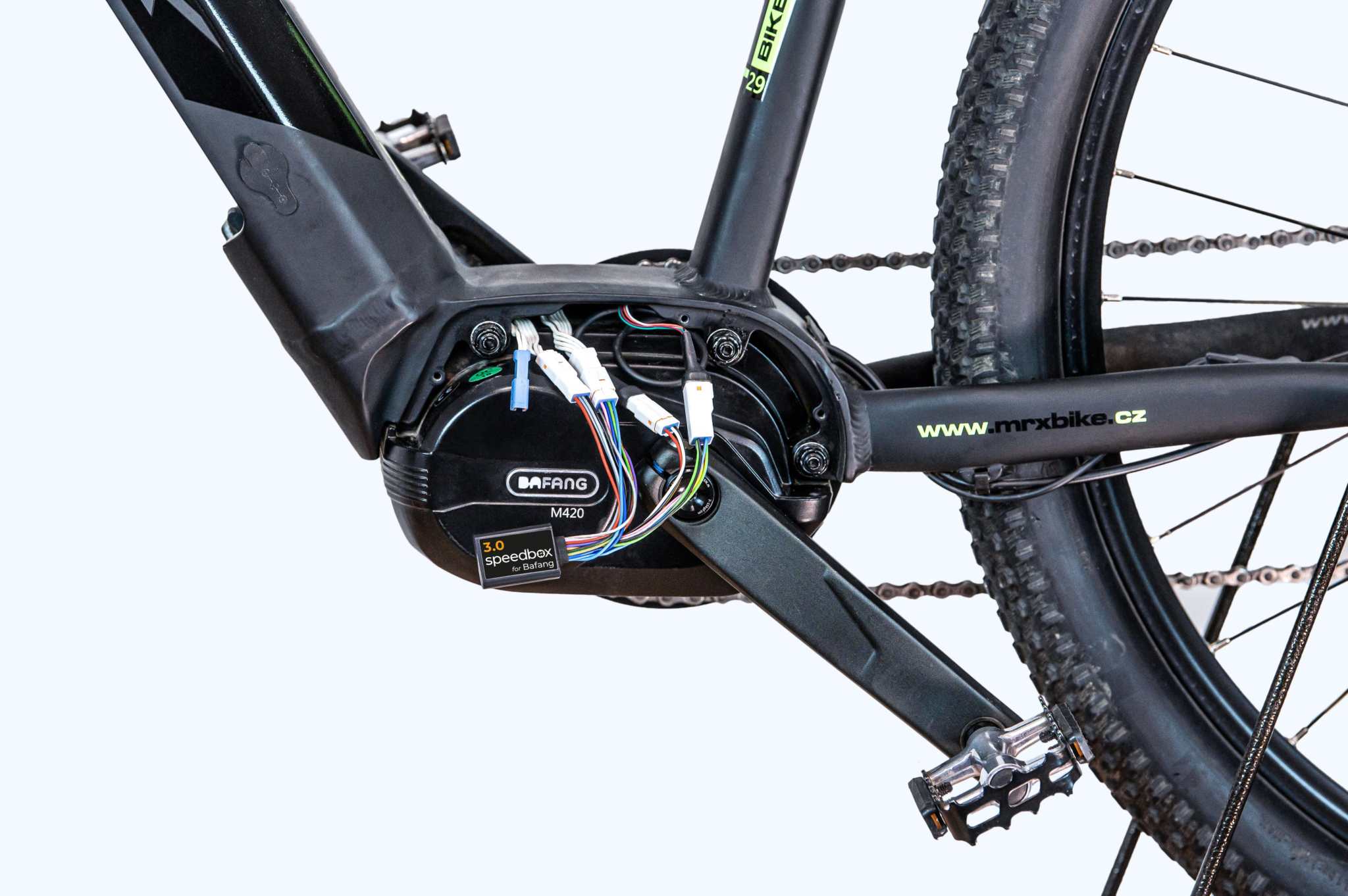 SpeedBox 3.0 module installed on Bafang M420 electric bike motor with 3-pin connector for speed limit removal